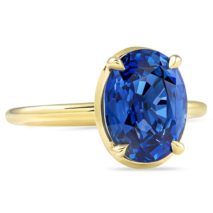 4.06 carat Blue Sapphire Yellow Gold Engagement Ring flat