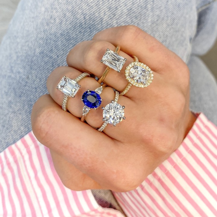 Blue Oval Sapphire and Diamond Three-Stone Ring flat