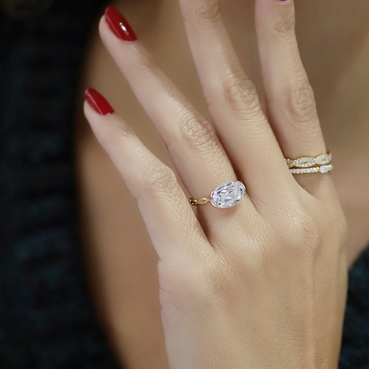 4.04 carat Hybrid Oval Lab East-West Half-Bezel Braided Ring flat