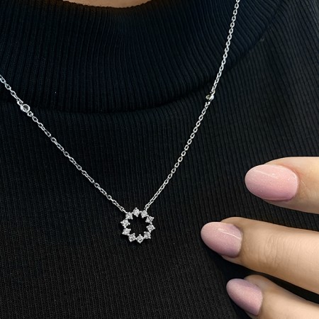 Open Circle Starburst Diamond Pendant close up
