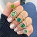 Tsavorite and Diamond Five-Stone Engagement Ring lifestyle green
