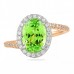 Oval Merelani Mint Garnet Swoop Halo Ring