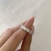 3.35 carat Radiant Cut Lab Diamond U-Shape Eternity Band lifestyle pinch