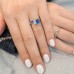 Oval Sapphire and Emerald Cut Diamond Duo Ring on ladies lifestyle