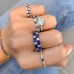 Oval Sapphire and Round Diamond Wedding Band lifestyle