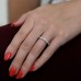 Alternating Pear and Round Diamond Bezel Halfway Band hand