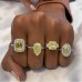 2.88 carat Yellow Emerald Cut Diamond Halo Engagement Ring lifestyle fist